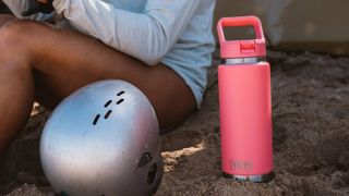Tropical Pink YETI Water Bottle on sand