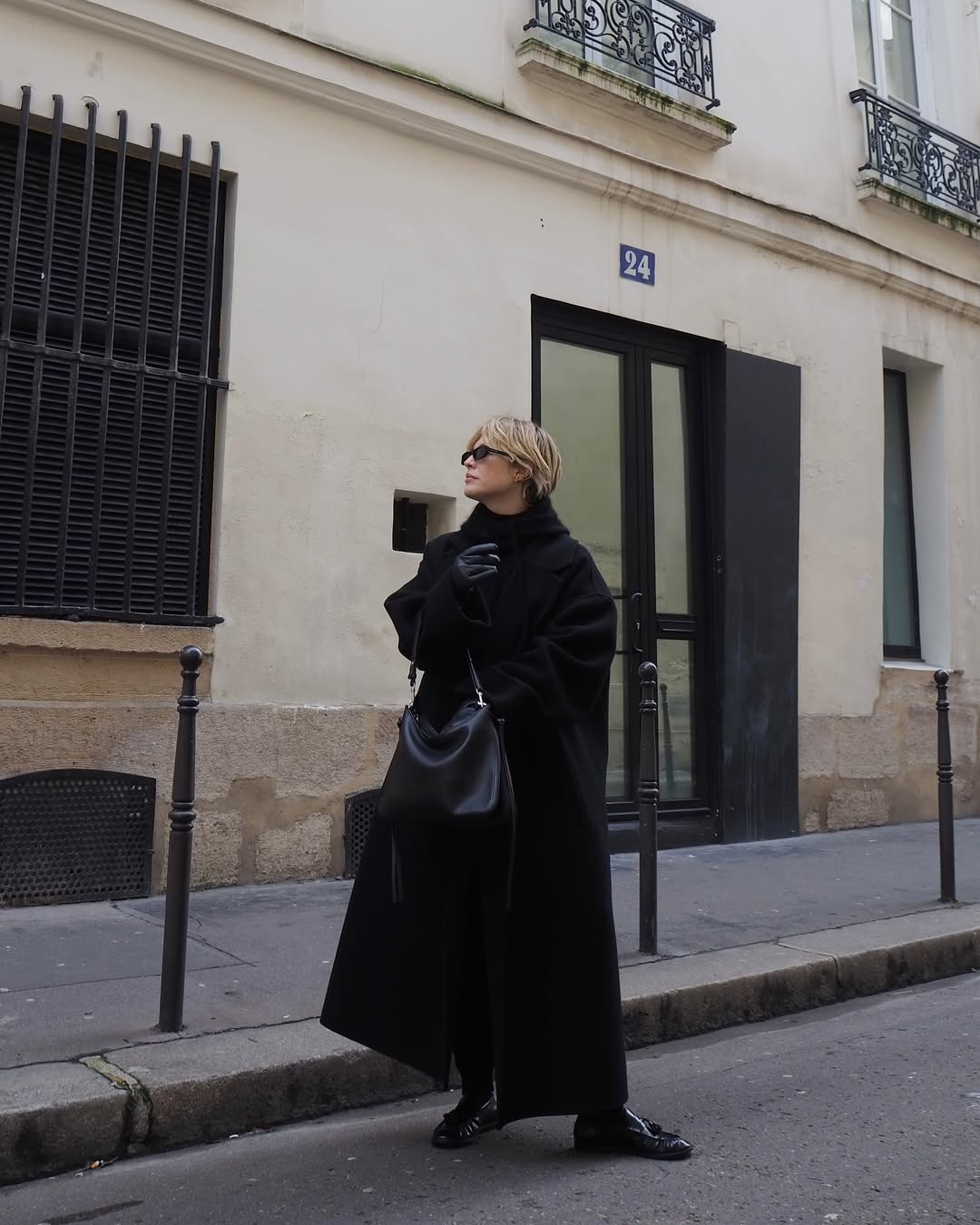 Alexis in an all black monochrome outfit