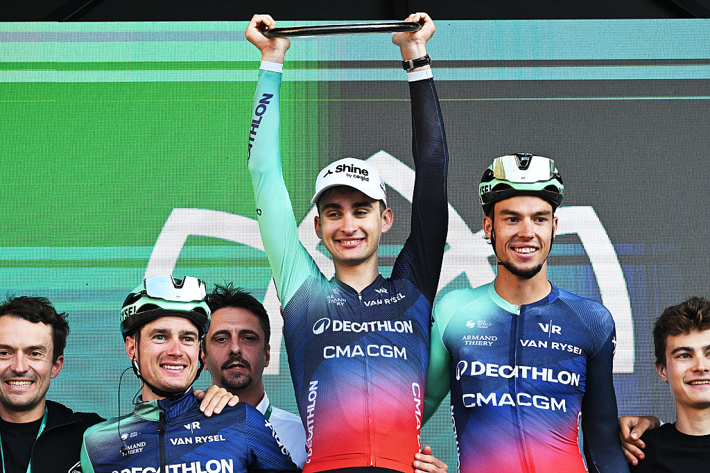 COMO, ITALY - OCTOBER 10: Paul Seixas of France and Team Decathlon CMA CGM Team celebrates at podium as race winner with his teammates during the 120th Il Lombardia 2026 a 239km one day race from Bergamo to Como / #UCIWT / on October 10, 2026 in Como, Italy. (Photo by Dario Belingheri/Getty Images)