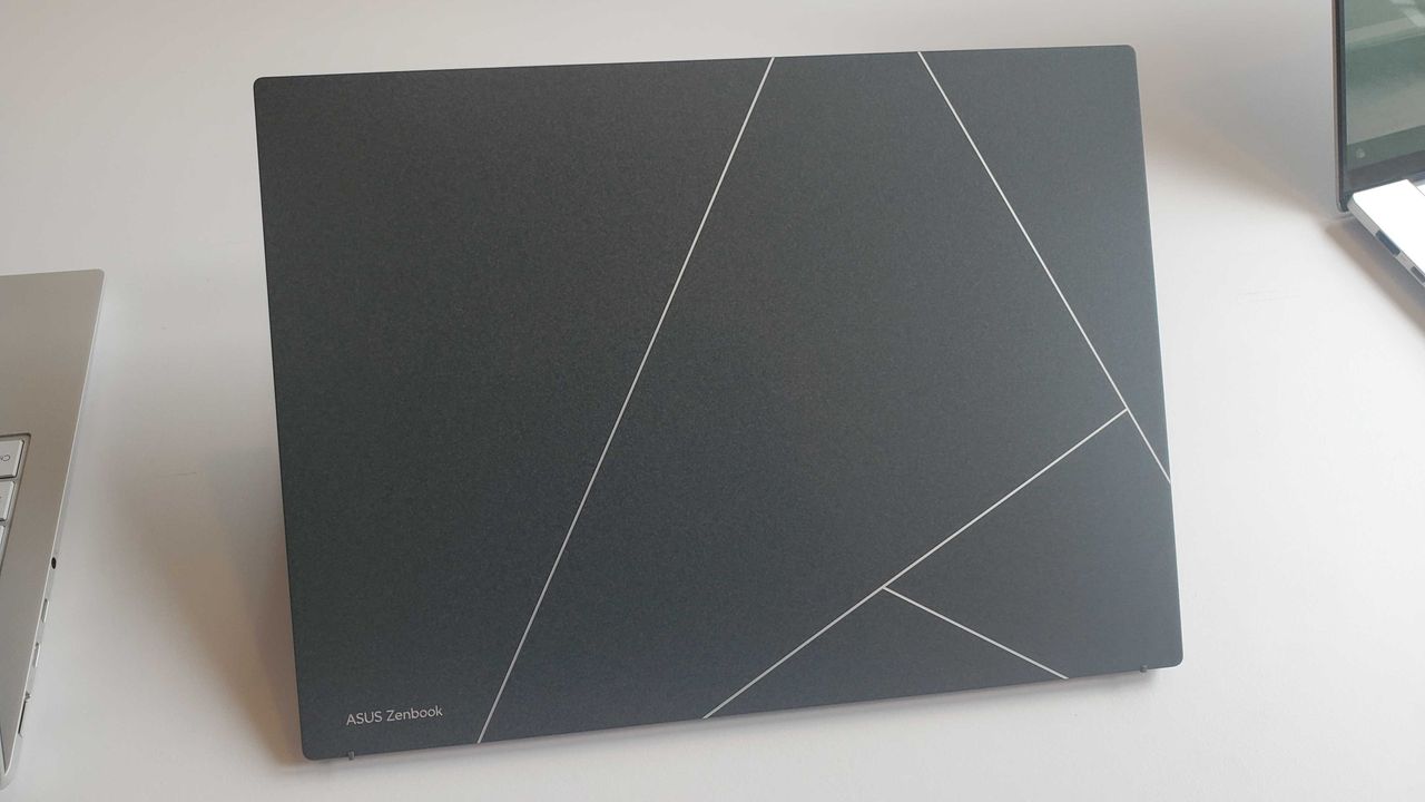 grey laptop on table