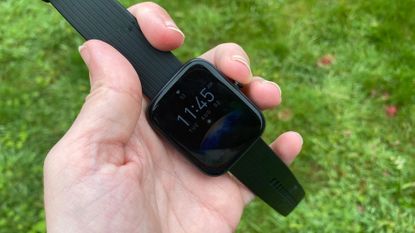 The Amazfit Bip 3 Pro showing the time