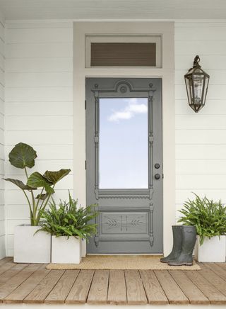 grey front door painted in Benjamin Moore Kendall Charcoal high gloss paint