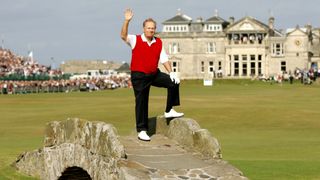 Jack Nicklaus waves to the crowd on the Swilcan Bridge at the 2005 Open