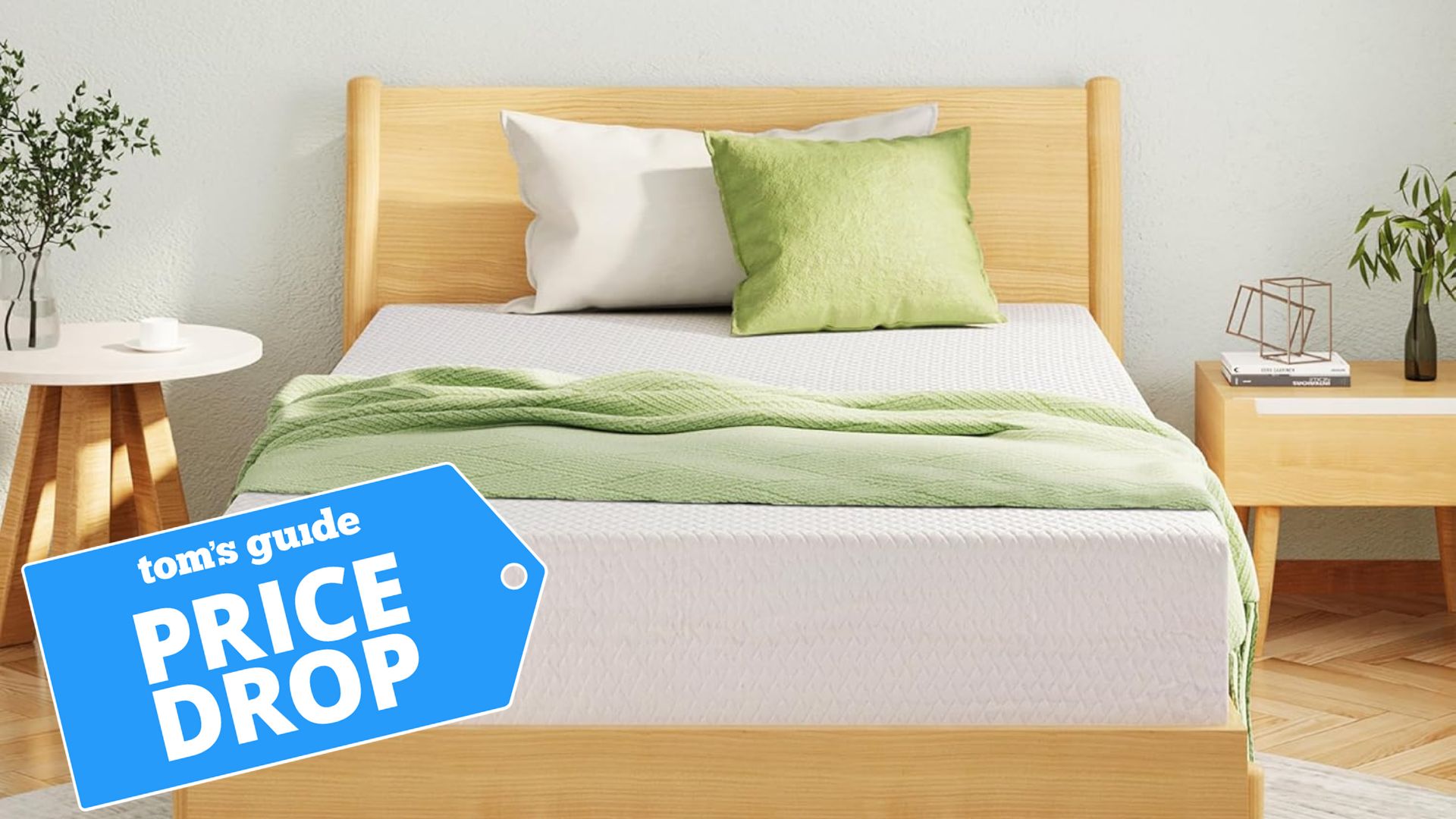 EgoHome Memory Foam mattress on a wooden bed frame with a green throw on it
