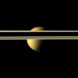 Saturn's rings obscure part of Titan in this image from NASA's Cassini spacecraft
