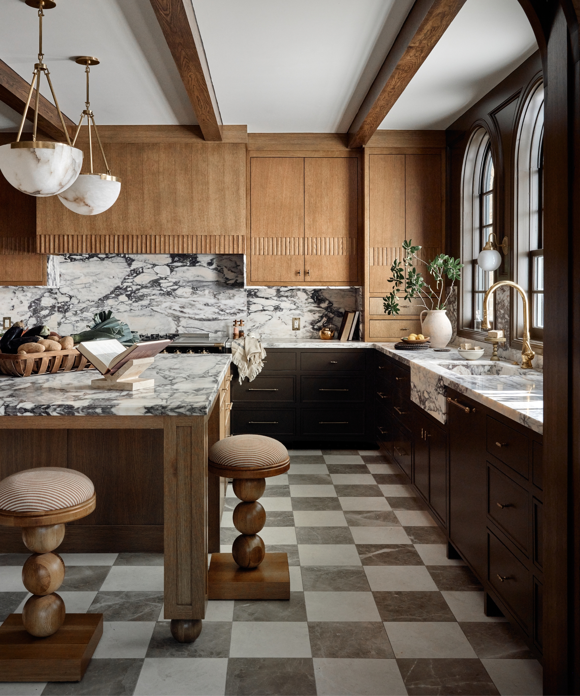 A wooden kitchen with tonal checkerboard floors