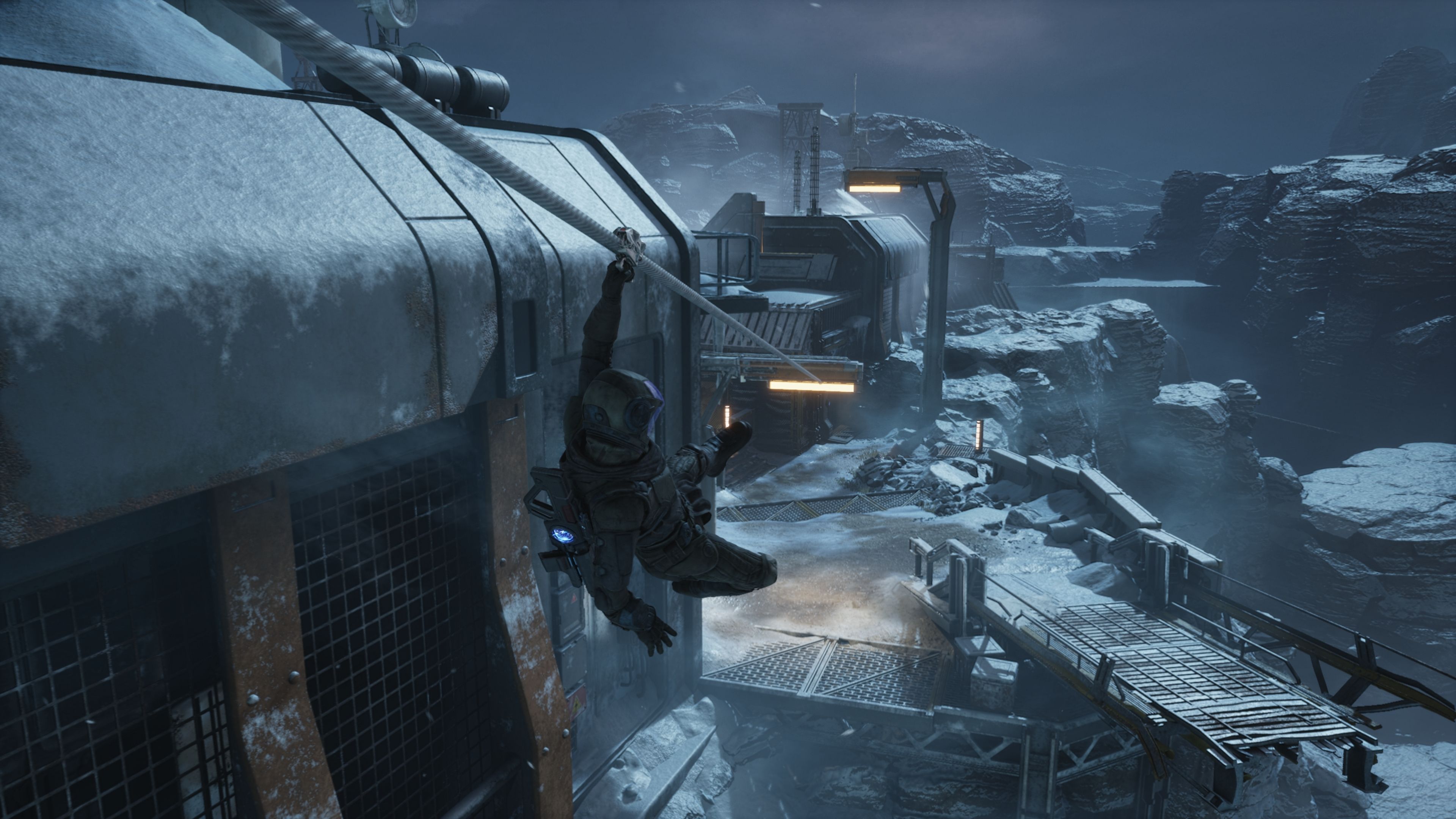 Exodus screenshot of Jun traversing down a zipline on a snowy planet