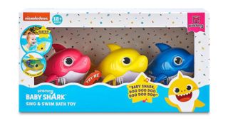 The trio set of Baby Shark toys in pink, yellow and blue.