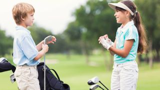 Boy and Girl golfers