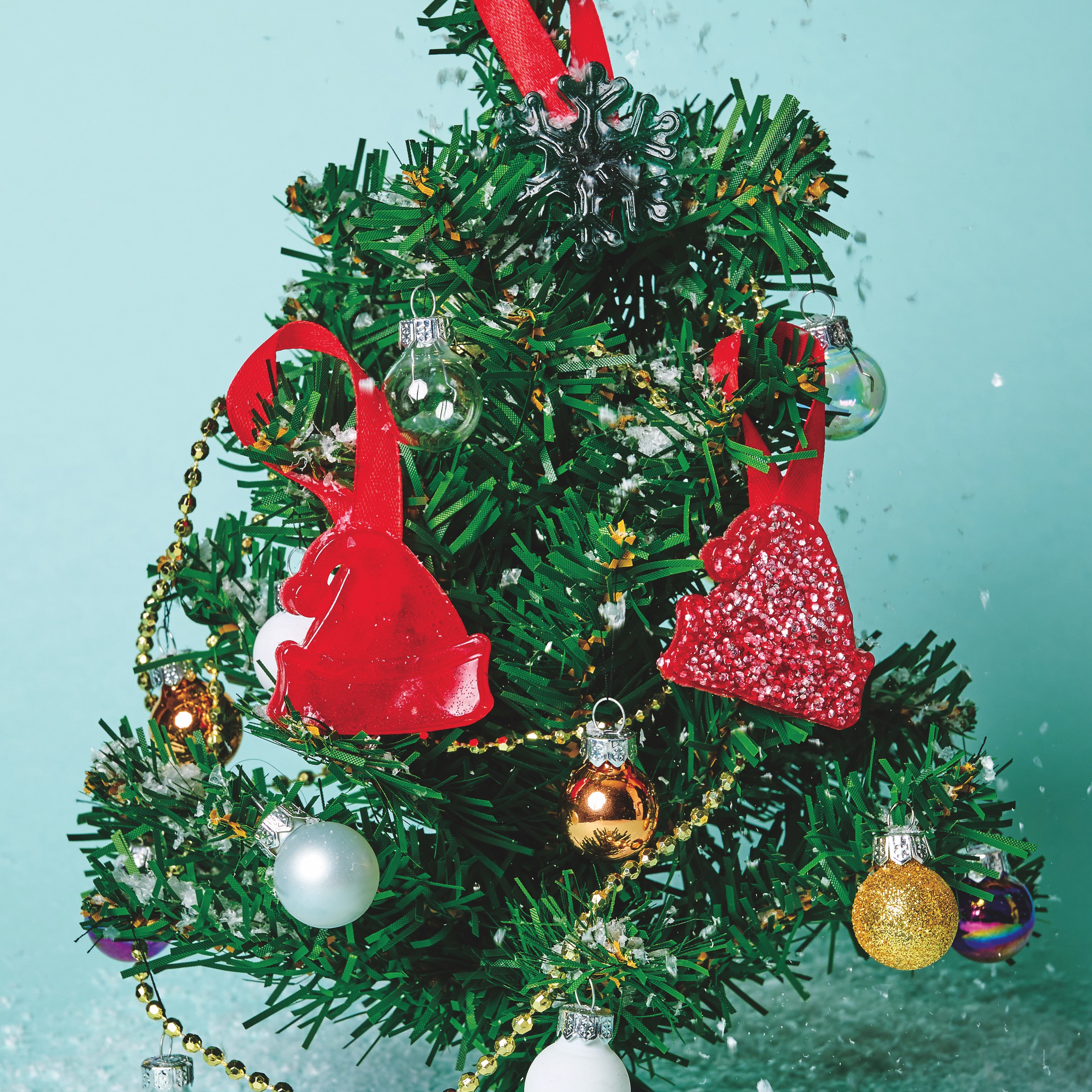 Tiny Christmas tree with bioplastic decorations