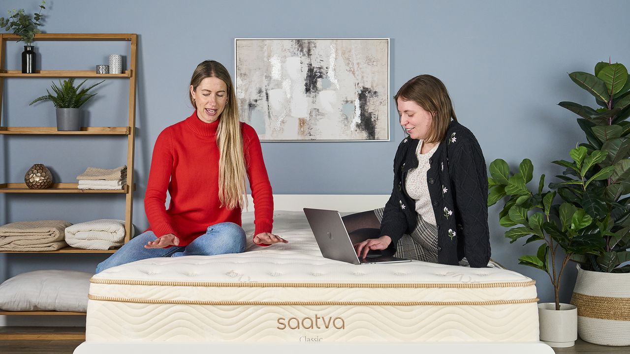 Tom's Guide's Sleep Editor and Senior Sleep Staff Writer sit on the Saatva Classic and discuss how it feels compared to other mattresses we have recently tested