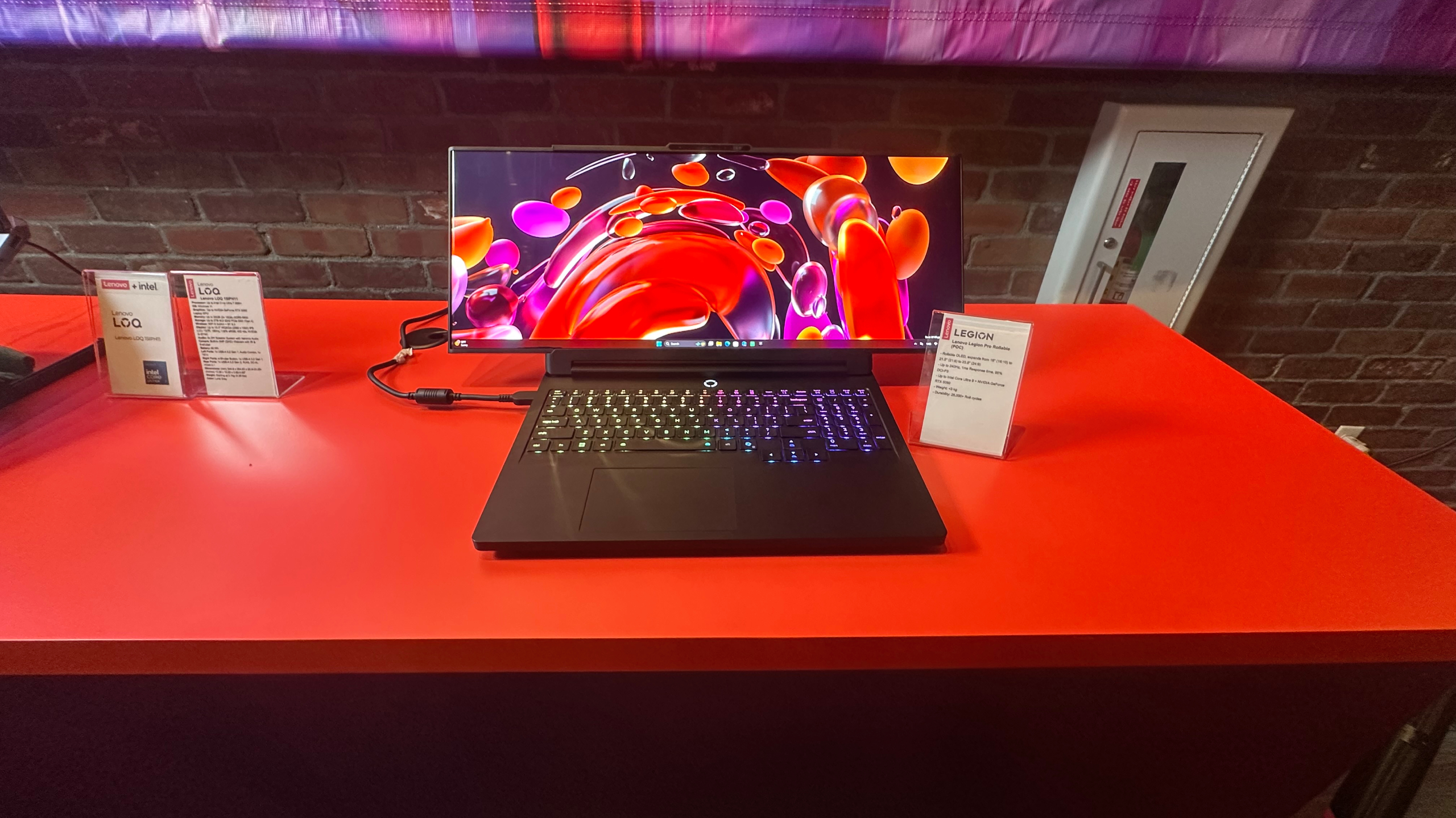 Lenovo Legion Pro Rollable laptop on a red desk