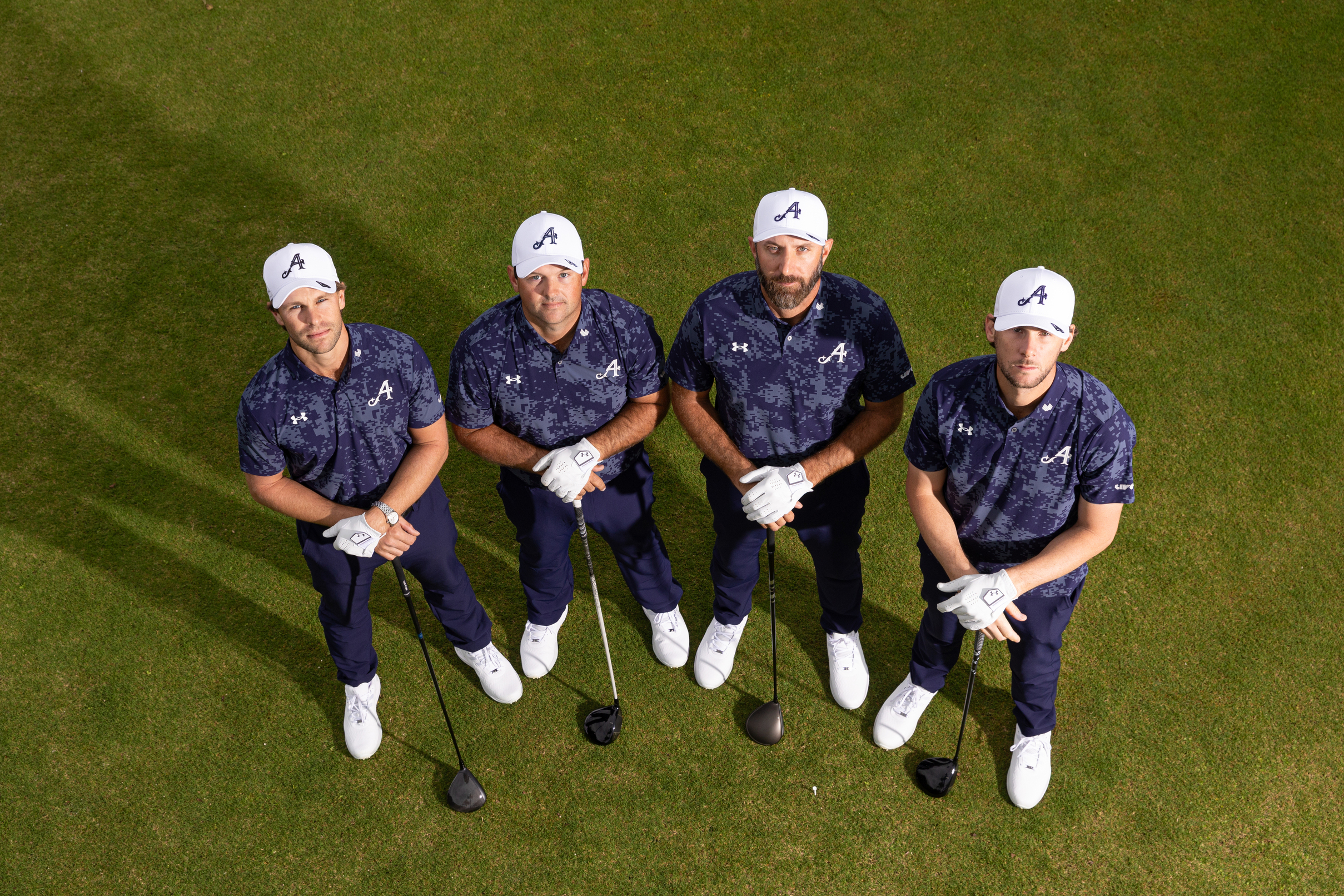 Captain Dustin Johnson, Patrick Reed, Thomas Pieters and Thomas Detry of 4Aces GC pose together during the LIV Golf Week