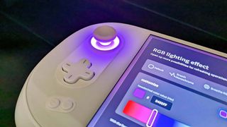 AYANEO 2S left joystick with purple RGB lighting.