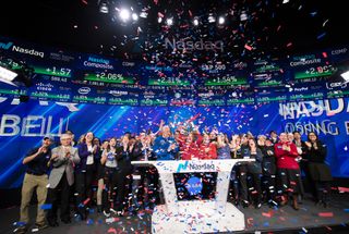 NASA Deputy Associate Administrator Melanie Saunders and retired NASA astronaut Mike Massimino ring the Nasdaq closing bell after the InSight lander successfully touched down on Mars.