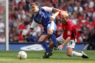 Millwall player-manager Dennis Wise in action against Manchester United in the 2004 FA Cup final