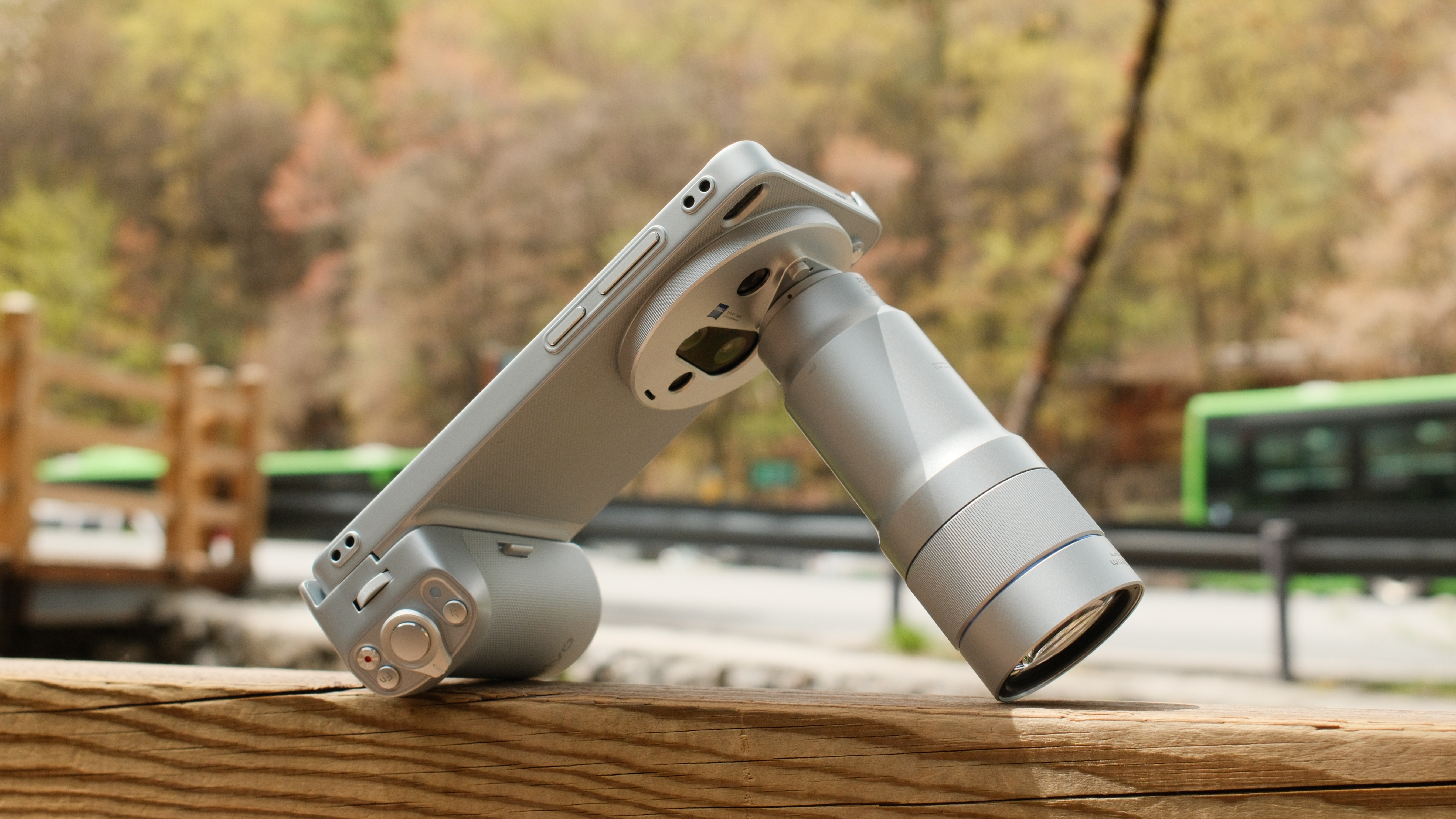 Side view of the Vivo X300 Ultra with its grip case and telephoto lens attached