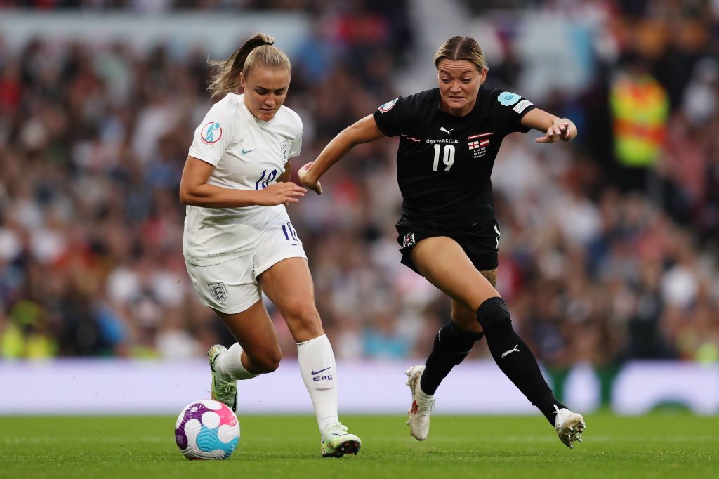 Women&#039;s Euro 2022: Who are the England vs Austria BBC commentators? Georgia Stanway of England runs with the ball whilst under pressure from Verena Hanshaw of Austria during the UEFA Women&#039;s EURO 2022 group A match between England and Austria at Old Trafford on July 06, 2022 in Manchester, England.