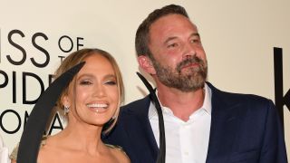 JLo and Ben Affleck smiling at the premiere of Kiss of the Spider Woman