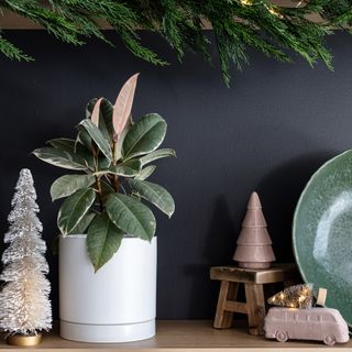 neutral christmas decor on a shelf