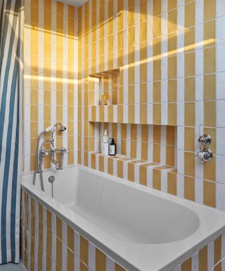 bathroom wil yellow and white stripe tiles