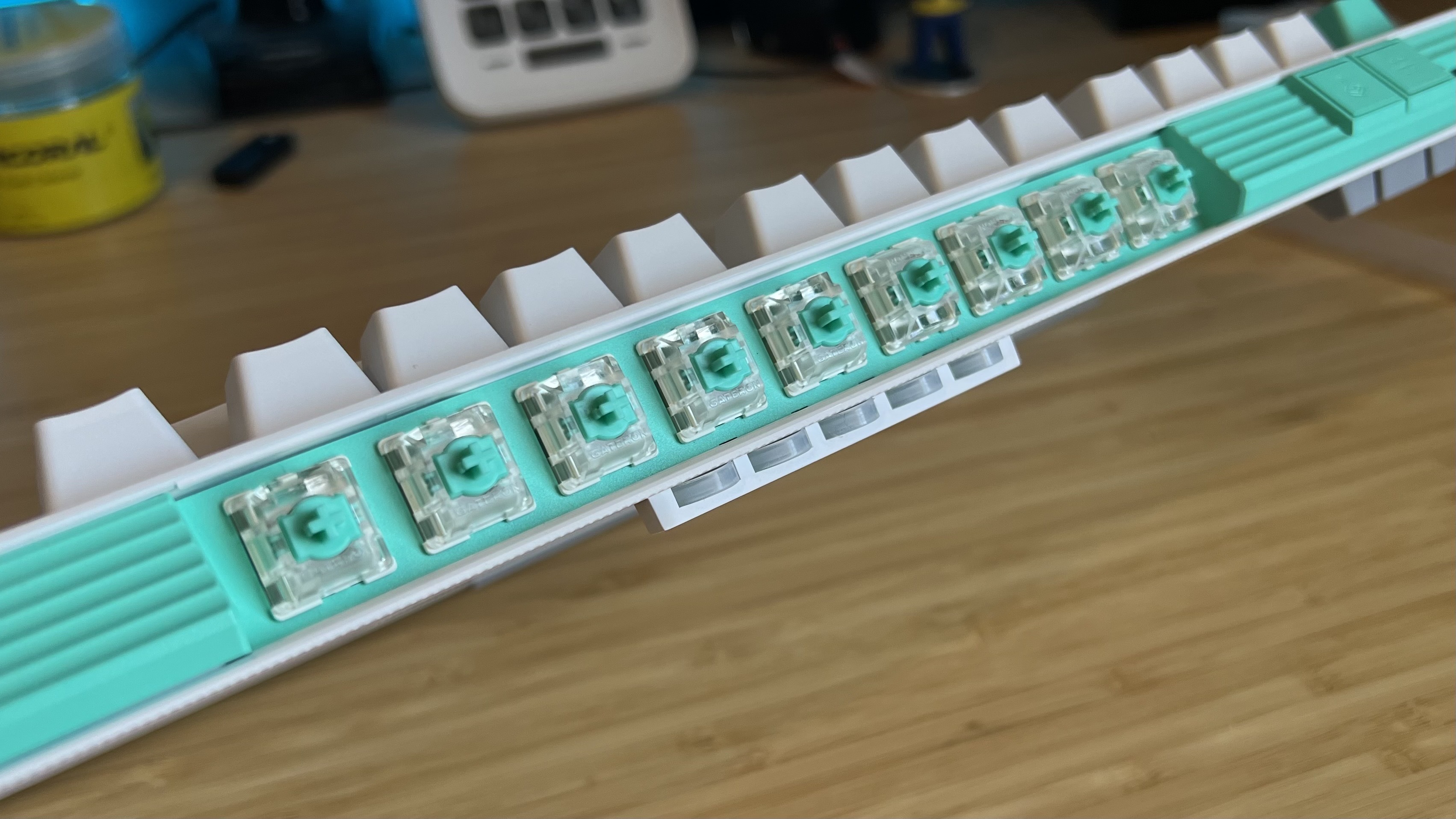 Top of Logitech G512 X gaming keyboard showing included magnetic switches