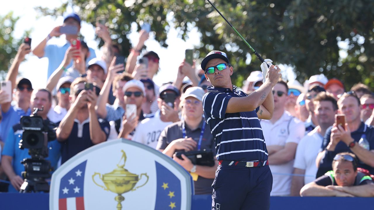 Rickie Fowler of Team United States tees off on the 12th hole during the Friday morning foursomes matches of the 2023 Ryder Cup