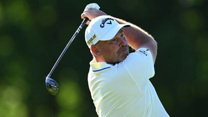 Thomas Bjorn hits a golf shot