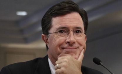Stephen Colbert meets with members of the Federal Election Commission to request to form a super PAC. 