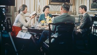 Queen Elizabeth II lunches with Prince Philip and their children Princess Anne and Prince Charles at Windsor Castle in Berkshire
