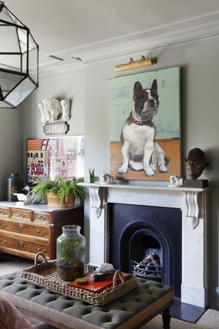 Living room with fireplace and artwork