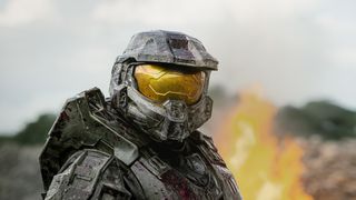 Master Chief standing in front of an explosion in Halo