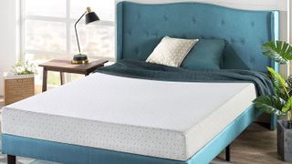 The Zinus Green Tea Memory Foam mattress on a bed