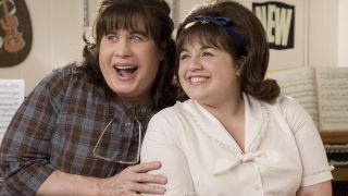 Nikki Blonsky and John Travolta smiling in Hairspray