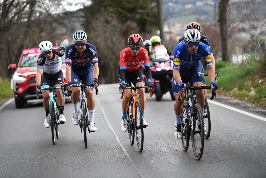 CASTELFIDARDO ITALY MARCH 14 Filippo Ganna of Italy and Team INEOS Grenadiers Jonas Rickaert of Belgium and Team AlpecinFenix Robert Stannard of Australia and Team BikeExchange Pello Bilbao Lopez De Armentia of Spain and Team Bahrain Victorious Davide Ballerini of Italy and Team Deceuninck QuickStep during the 56th TirrenoAdriatico 2021 Stage 5 a 205km stage from Castellalto to Castelfidardo 175m Breakaway TirrenoAdriatico on March 14 2021 in Castelfidardo Italy Photo by Tim de WaeleGetty Images