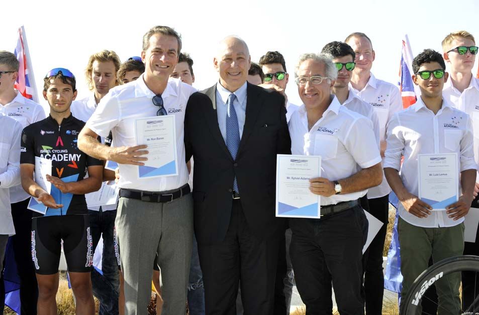 Co-owners Ron Baron and Sylvan Adams given certificates for 'ambassadors for peace' at the Peres Centre for Peace