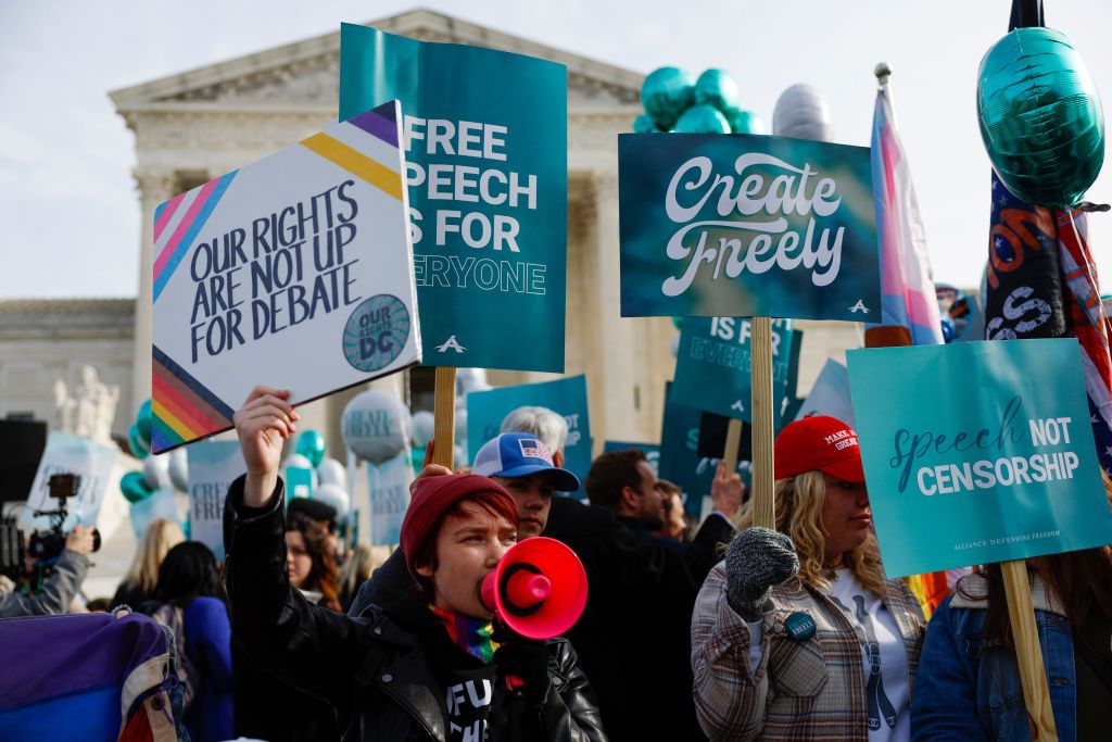 protesters demonstrate in front of the U.S. Supreme Court Building