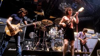 AC/DC performs at the Orpheum Theater, in Boston, Massachusetts, October 9, 1978 Malcolm Young, Phil Rudd, Angus Young, Cliff Williams, Bon Scott
