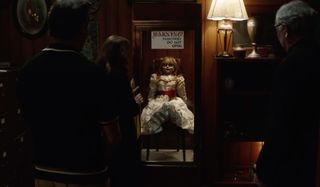 Annabelle Comes Home the doll is locked in its special cabinet