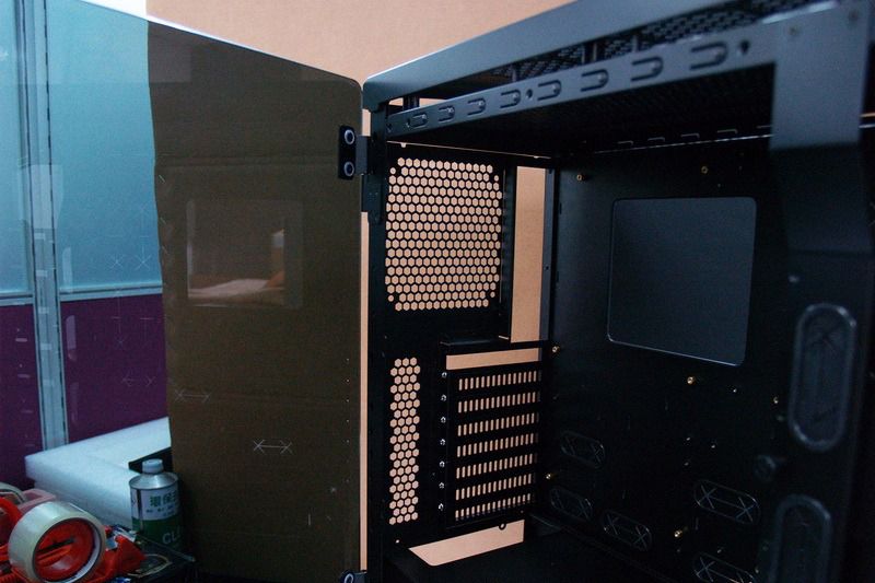 Unlike most PC cases, the Origin Millennium slots its tempered glass side panels into hinges