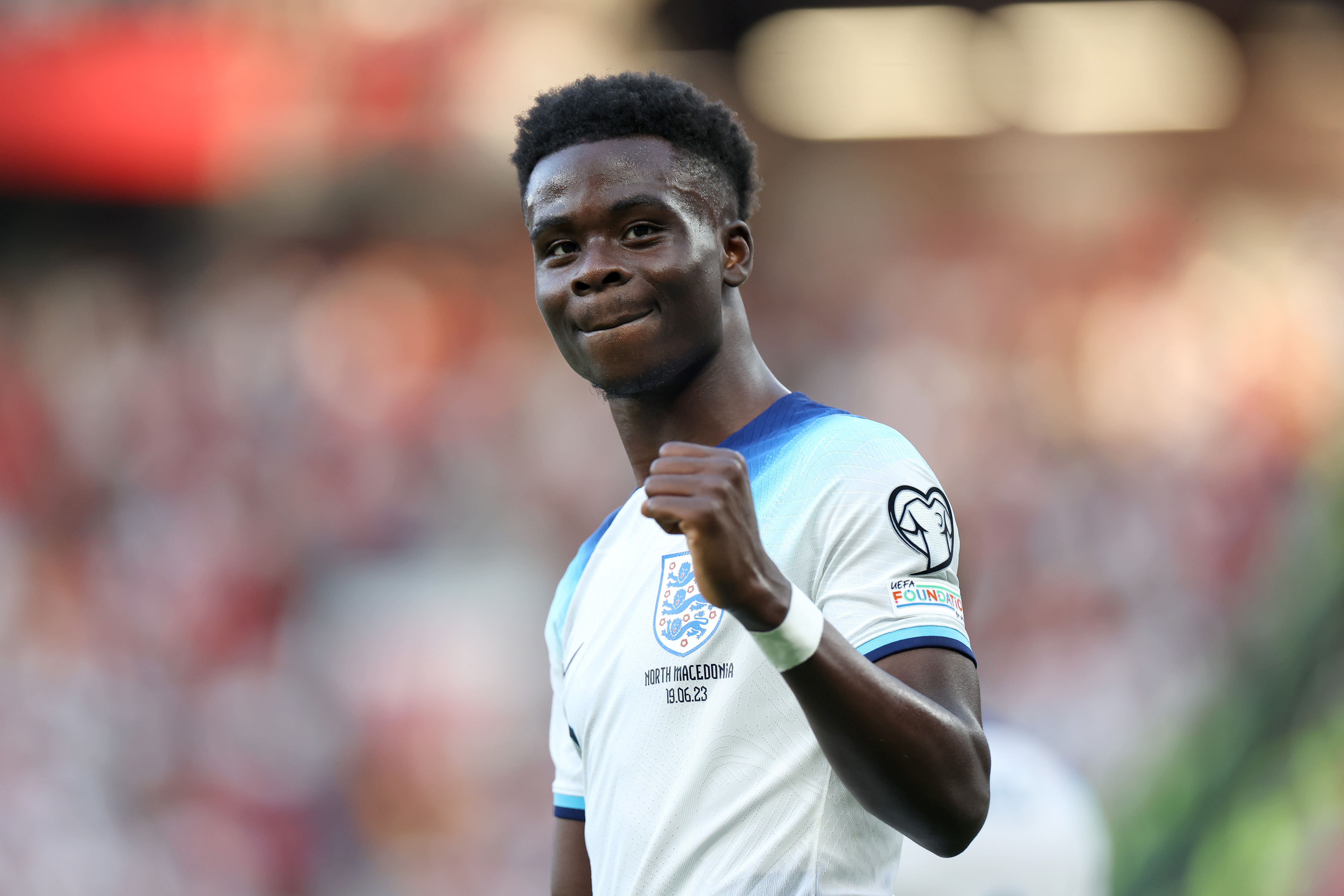 Bukayo Saka celebrates after scoring for England against North Macedonia in June 2023.