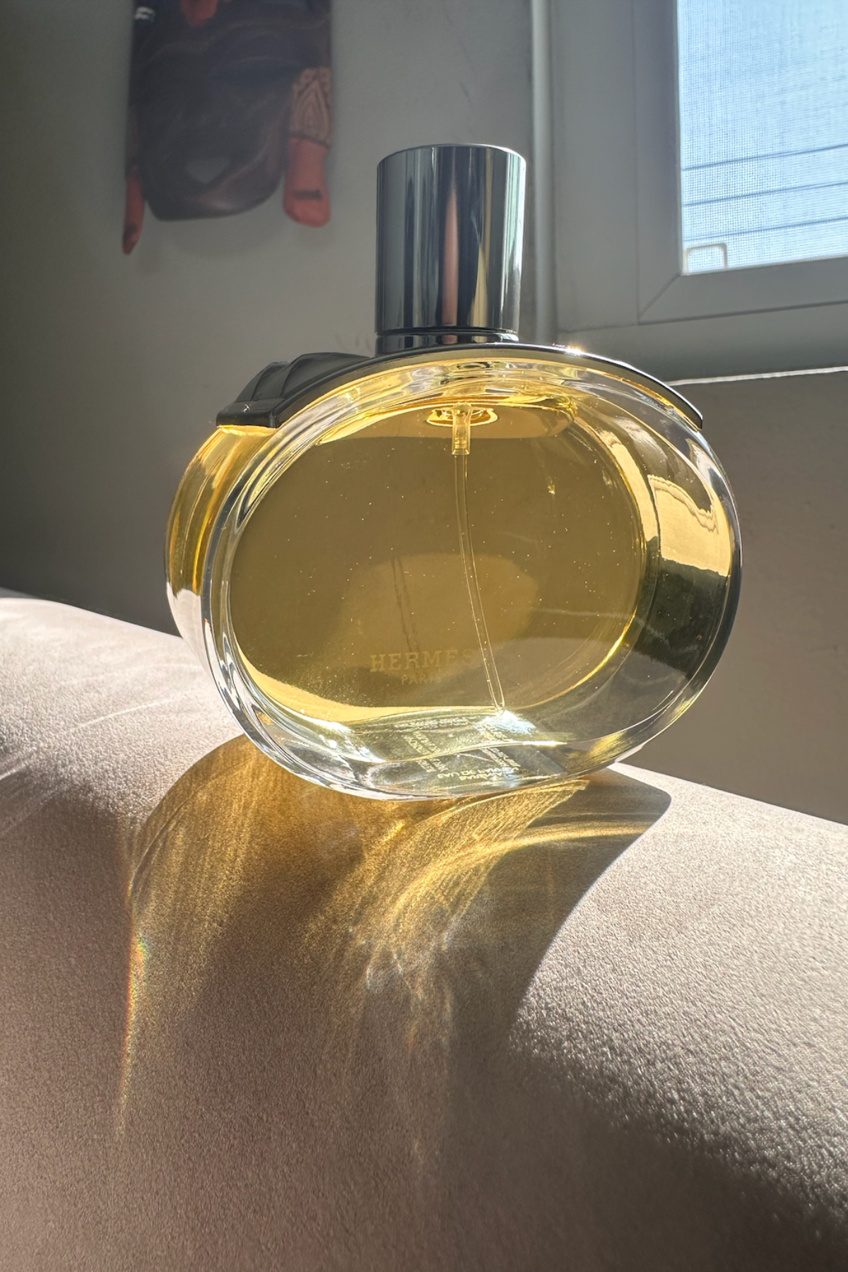 Kayla Greaves testing Hermes Barénia perfume.