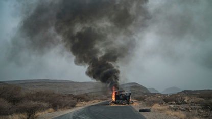 A truck burning out on a road in Ethiopia