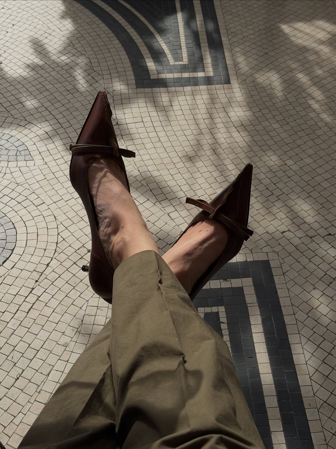 Women wearing the Prada Antiqued Leather Pumps