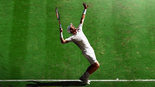 Former world number one men&#039;s tennis player Andy Murray in action serving on grass