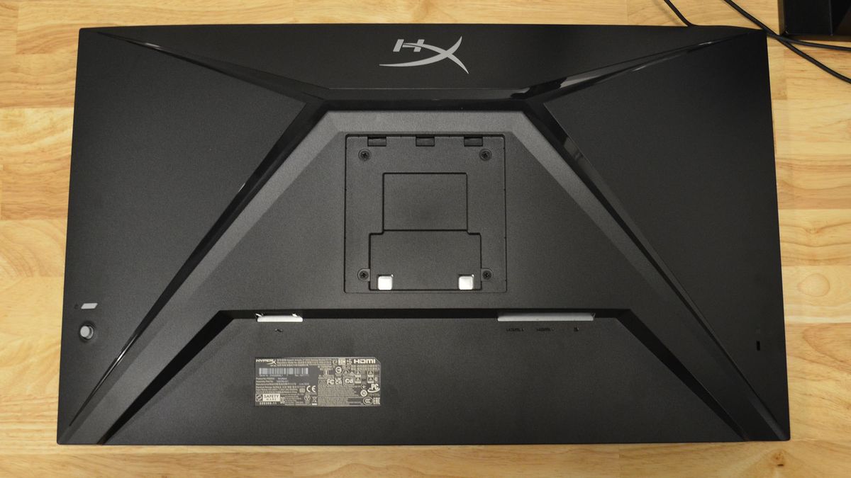 A HyperX Armada 27 on a wooden desk