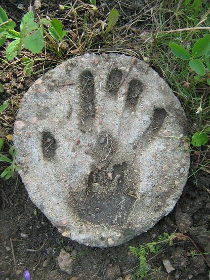 DIY Stepping Stone Of A Handprint
