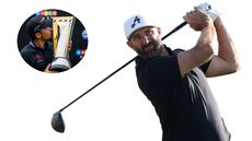 Dustin Johnson hits a driver off the tee, with Miguel Tabuena kissing a trophy