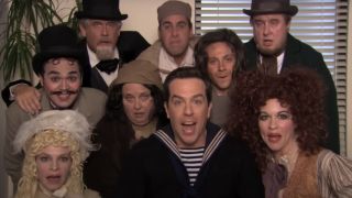 Andy surrounded by his fellow play cast members in The Office