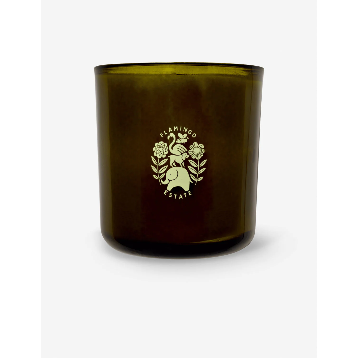 a candle in a dark green glass jar